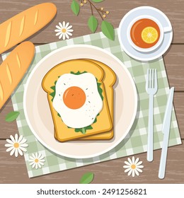 Toast, Fried Egg, Baguette Bread and Tea For Breakfast or Brunch with Flower and Leaves Decoration on Top of Wooden Table