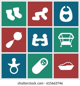 Toddler icons set. set of 9 toddler filled icons such as pacifier, baby socks, beanbag, playpen