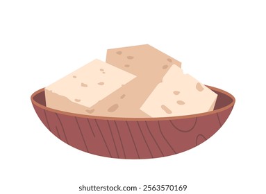 Tofu pieces in wooden bowl
