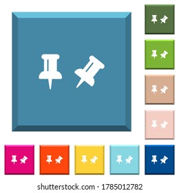 Toggle pin white icons on edged square buttons in various trendy colors