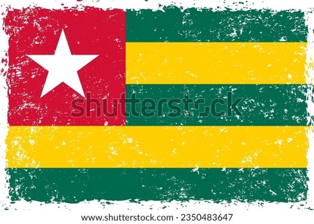 Togo flag in grunge distressed style