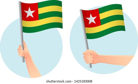 Togo flag in hand. Patriotic background. National flag of Togo vector illustration