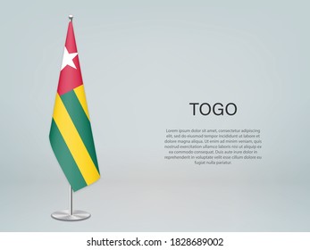 Togo hanging flag on stand. Template for politic conference banner