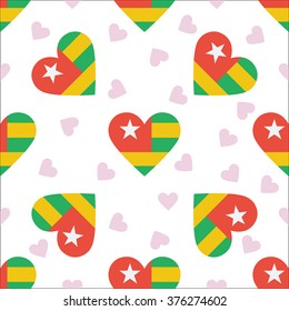 Togo independence day seamless pattern. Patriotic country flag background. Togo flag in the shape of heart. Vector seamless pattern.