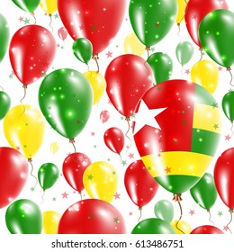 Togo Independence Day Seamless Pattern. Flying Rubber Balloons in Colors of the Togolese Flag. Happy Togo Day Patriotic Card with Balloons, Stars and Sparkles.