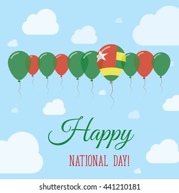 Togo National Day Flat Patriotic Poster. Row of Balloons in Colors of the Togolese flag. Happy National Day Togo Card with Flags, Balloons, Clouds and Sky.