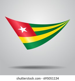 Togolese flag wavy abstract background. Vector illustration.