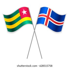 Togolese and Icelandic crossed flags. Togo combined with Iceland isolated on white. Language learning, international business or travel concept.