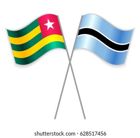 Togolese and Motswana crossed flags. Togo combined with Botswana isolated on white. Language learning, international business or travel concept.