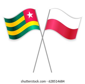 Togolese and Polish crossed flags. Togo combined with Poland isolated on white. Language learning, international business or travel concept.