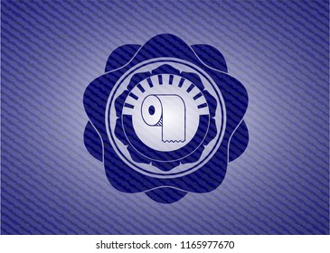 toilet paper icon inside badge with denim background