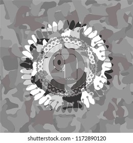toilet paper icon on grey camo pattern