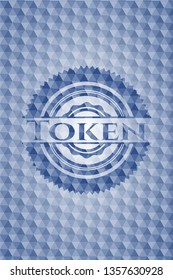 Token blue hexagon badge.
