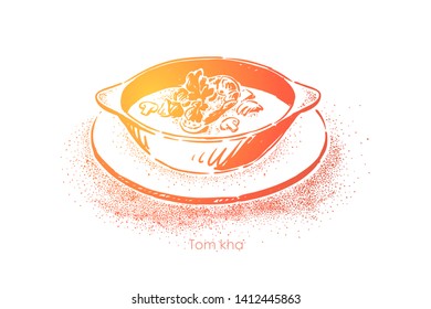 Tom kha kai, traditional thai cuisine, hot sour spicy soup with coconut milk, mushrooms and shrimp, exotic meal