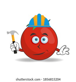 The Tomato mascot character becomes a builder. vector illustration