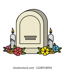 tombstone with flowers and candles