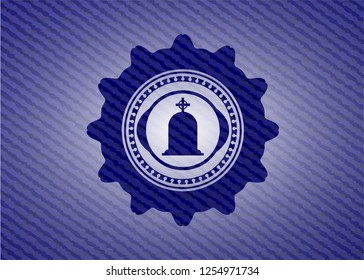 tombstone icon inside badge with denim texture