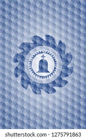 tombstone icon inside blue emblem or badge with geometric pattern background.