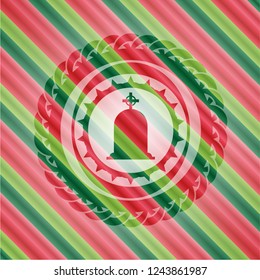 tombstone icon inside christmas colors badge.