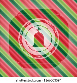 tombstone icon inside christmas emblem.