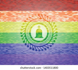 tombstone icon inside emblem on mosaic background with the colors of the LGBT flag