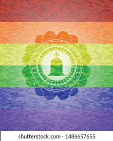 tombstone icon inside emblem on mosaic background with the colors of the LGBT flag