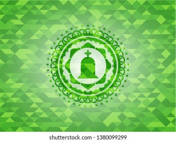 tombstone icon inside green emblem with triangle mosaic background