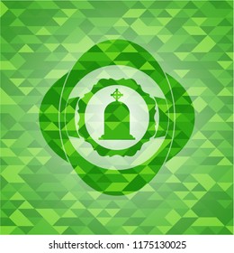 tombstone icon inside green mosaic emblem