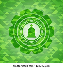 tombstone icon inside green mosaic emblem
