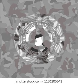 tombstone icon inside grey camo emblem