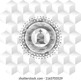 tombstone icon inside grey emblem with geometric cube white background