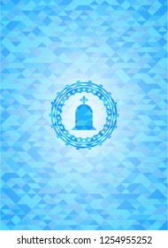 tombstone icon inside light blue emblem with triangle mosaic background