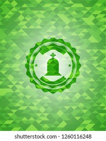 tombstone icon inside realistic green mosaic emblem