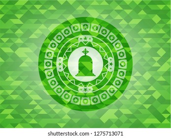tombstone icon inside realistic green emblem. Mosaic background