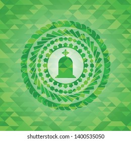 tombstone icon inside realistic green emblem. Mosaic background