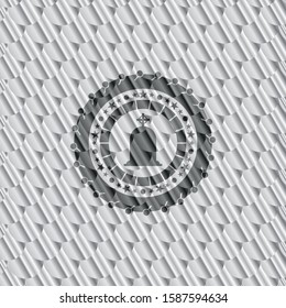 tombstone icon inside shiny silver badge. Scales pattern. Vector Illustration. Detailed.