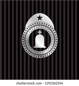 tombstone icon inside silver emblem