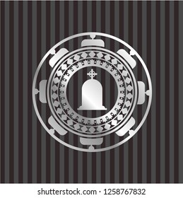 tombstone icon inside silvery emblem or badge