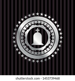 tombstone icon inside silvery emblem or badge