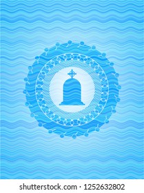 tombstone icon inside sky blue water style badge.