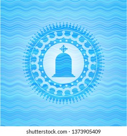tombstone icon inside sky blue water wave style emblem.