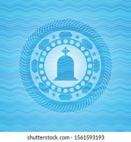 tombstone icon inside sky blue water wave style badge.
