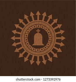 tombstone icon inside wood badge or emblem