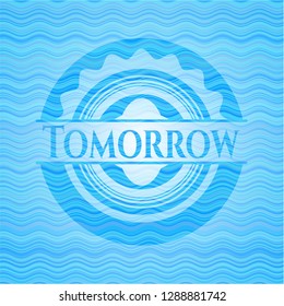 Tomorrow light blue water wave badge.