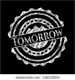 Tomorrow written on a chalkboard