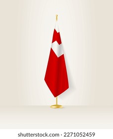 Tonga flag on a flag stand. Vector illustration.