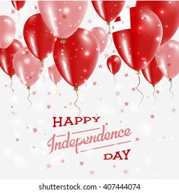Tonga Independence Day Celebration Balloons. Flying Rubber Celebration Balloons in Colors of the Tonga National Flag. Happy Tonga Day Celebration Balloons, Stars and Sparkles.