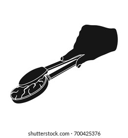 Tongs with raw steak. Eating and cooking single icon in black style vector symbol stock illustration web.