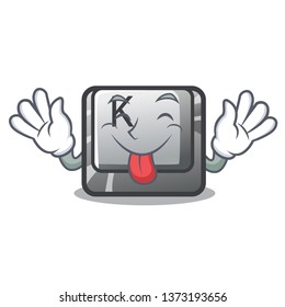 Tongue out button K attached to cartoon keyboard