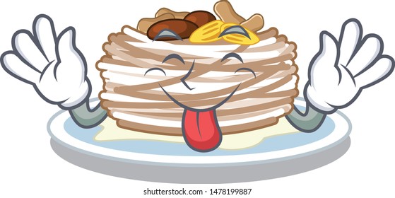 Tongue out plate of kataifi cartoon on table